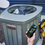 image of hvac tech performing maintenance